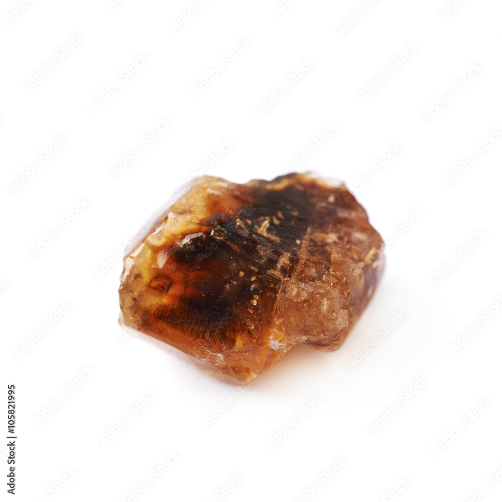 Single rock sugar crystal isolated Single rock sugar crystal isolated
