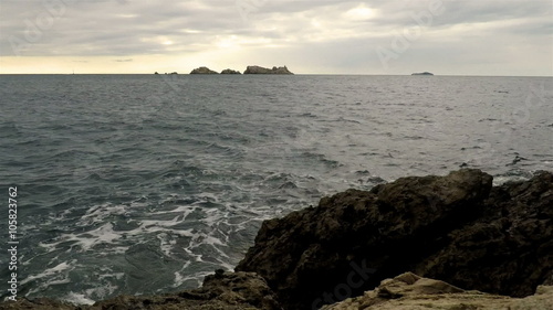 Slow motion scene of coastline with view at rocky island in Croatia