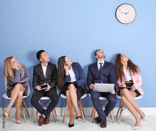 Young people sitting on a c...