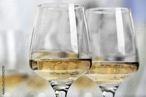 Glasses of white wine closeup
