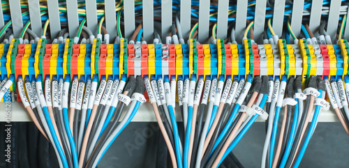 фотографія New control panel with circuit-breakers, fuses, rails, low voltage meters, current transformers, relays and other electrical equipment