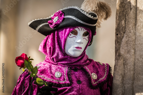 Venice - February 6, 2016: Colourful carnival mask through the streets of  Venice and in St. Mark's Square during celebration of the most famous carnival in the world. © strenghtofframe