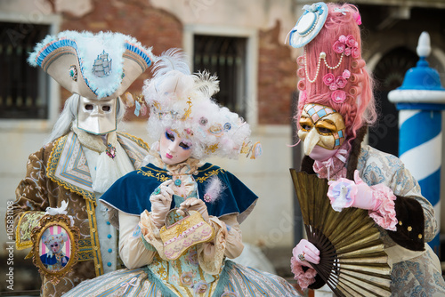 Venice - February 6, 2016: Colourful carnival mask through the streets of  Venice and in St. Mark's Square during celebration of the most famous carnival in the world.