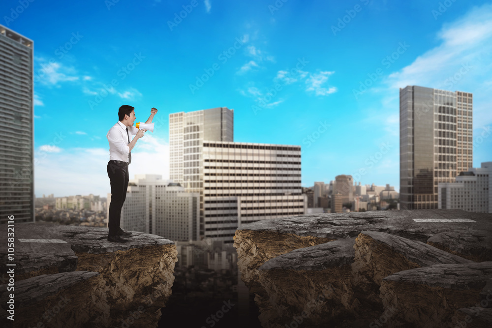 Business person using bullhorn