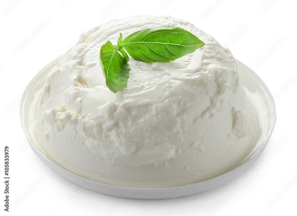 Thick cream with basil, isolated on white