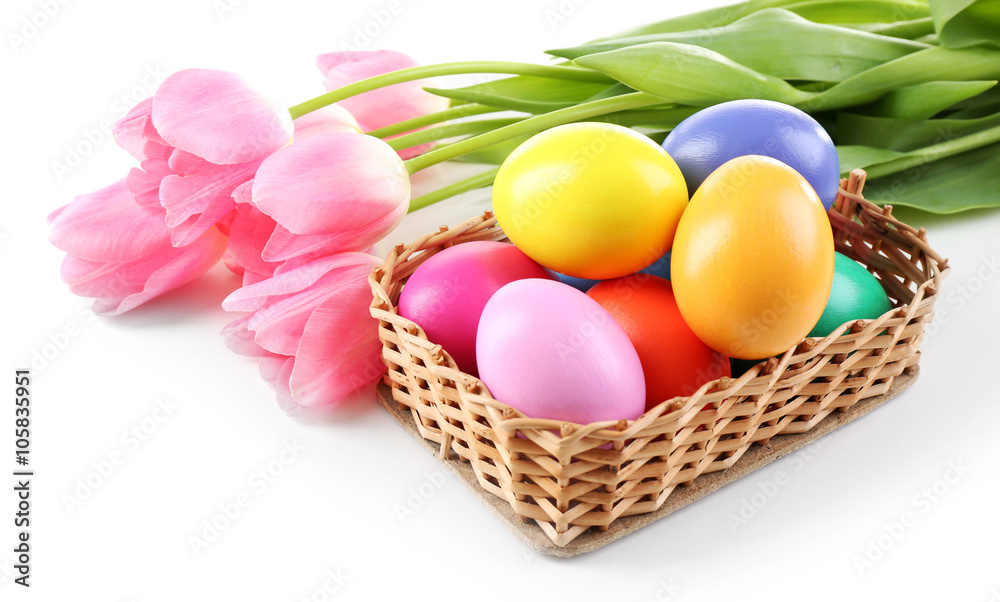 Multicoloured Easter eggs and tulips isolated on white Multicoloured Easter eggs and tulips isolated on white