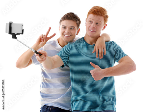 Two teenager boys making ph...