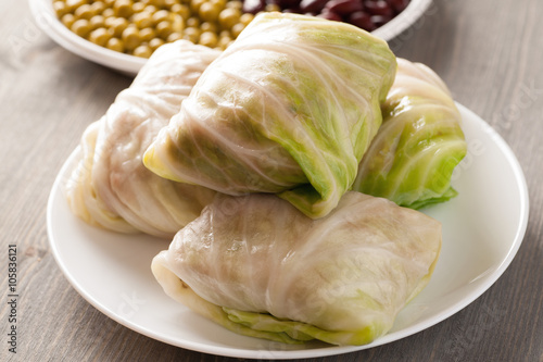 Stuffed cabbage rolls on a wooden table