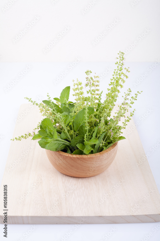 part of holy basil pile on cutting board part of holy basil pile on cutting board