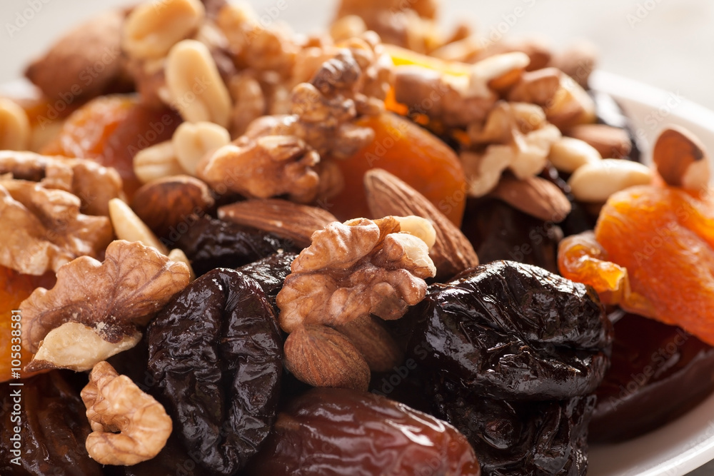 Mix of dried fruits with nuts closeup