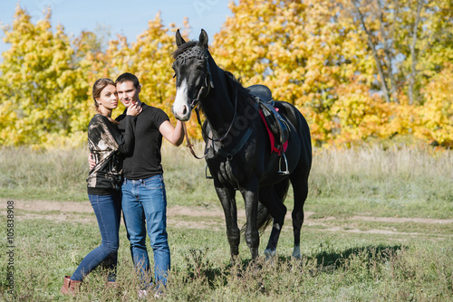 couple in love, horseback riding, tenderness, forest © Stanislav Samoylik
