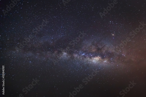 milky way on a night sky, Long exposure photograph, with grain.