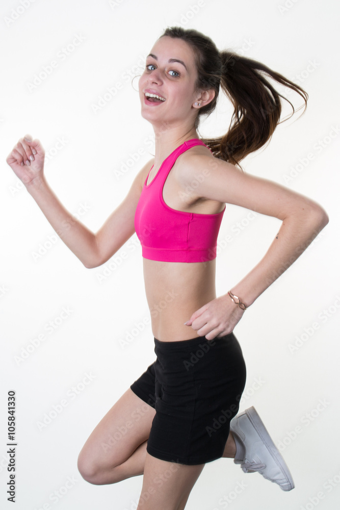 Portrait of a beautiful and athletic teenage girl, isolated Portrait of a beautiful and athletic teenage girl, isolated