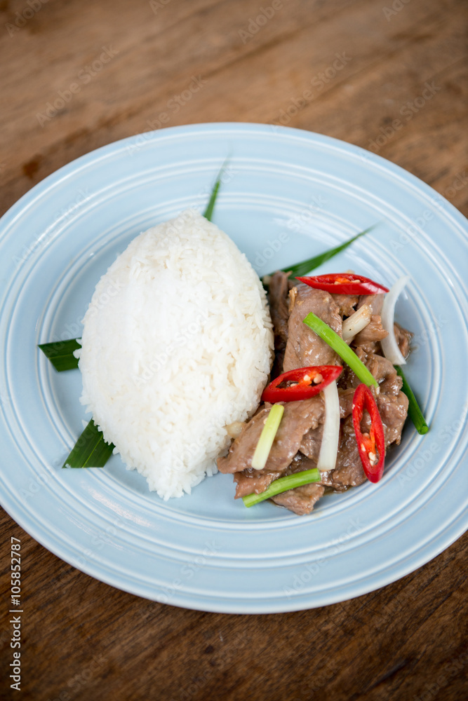 Thai beef stir fried with jasmine rice. Thai beef stir fried with jasmine rice.
