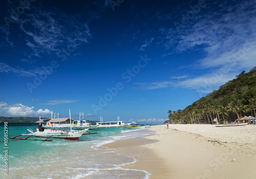 traditional filipino ferry taxi tour boats puka beach boracay ph photo