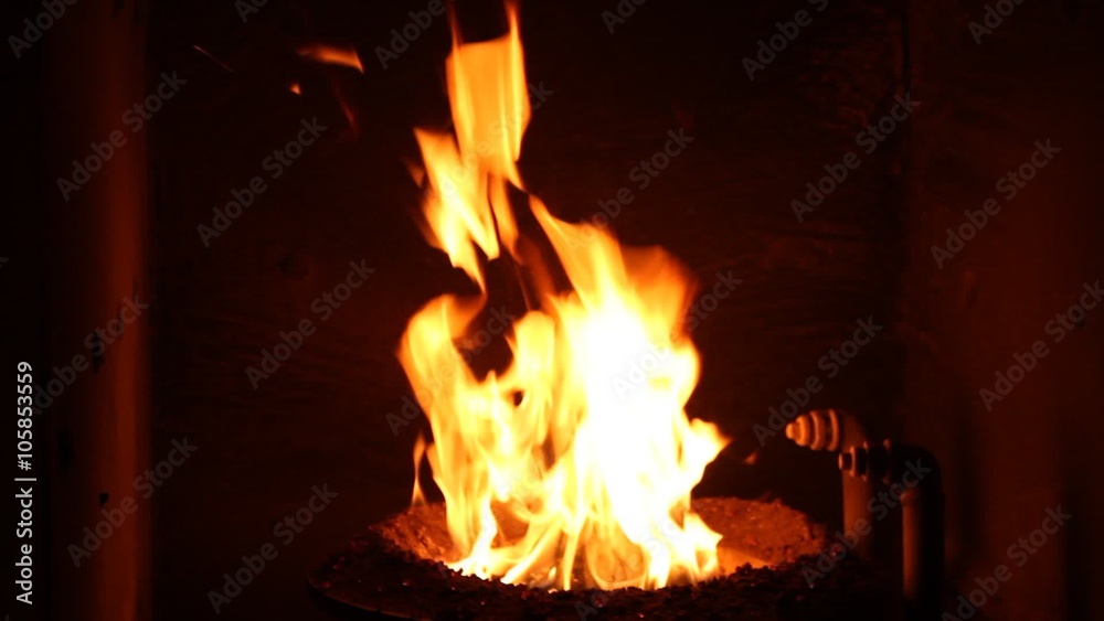 The fire in the furnace. Heating system. Solid fuel boiler. Open fire. The fire in the furnace. Heating system. Solid fuel boiler. Open fire.