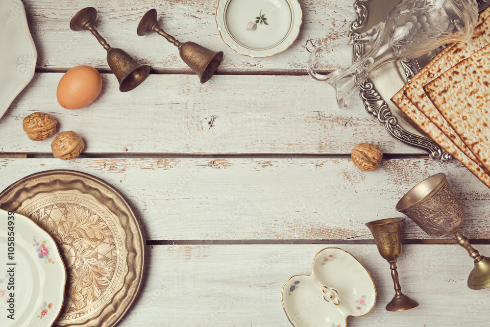 Jewish holiday Passover background with plates. View from above. Flat lay Jewish holiday Passover background with plates. View from above. Flat lay