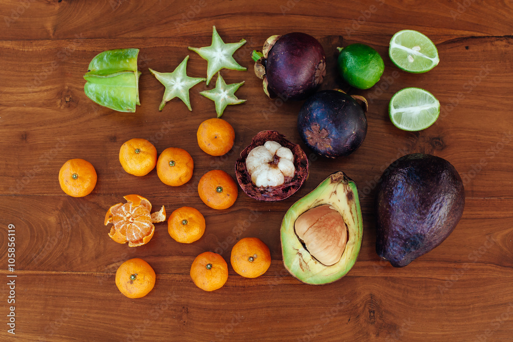 Exotic fruits variety on vintage wooden table