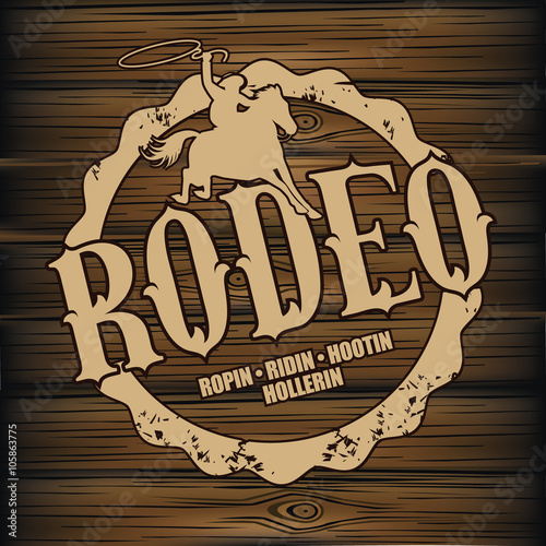 Rodeo brand design on wood background. EPS 10 vector.