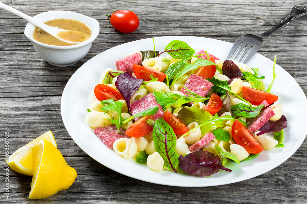 lettuce leaves, salami , nuts, honey, sesame seeds sauce, close-