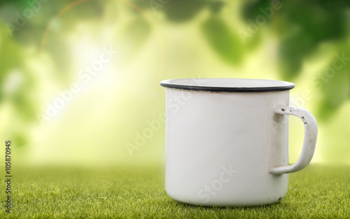 Mug on grass
