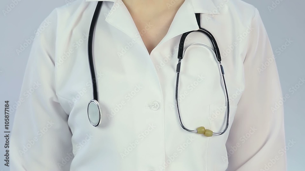 Medical worker showing X sign with hands, telling patient to quit bad habits Medical worker showing X sign with hands, telling patient to quit bad habits