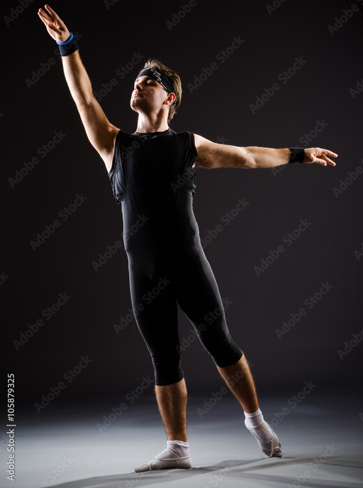Obraz premium Young man training for ballet dances