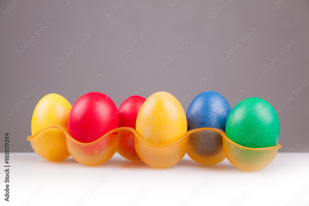 Easter colored eggs on a gray background Easter colored eggs on a gray background
