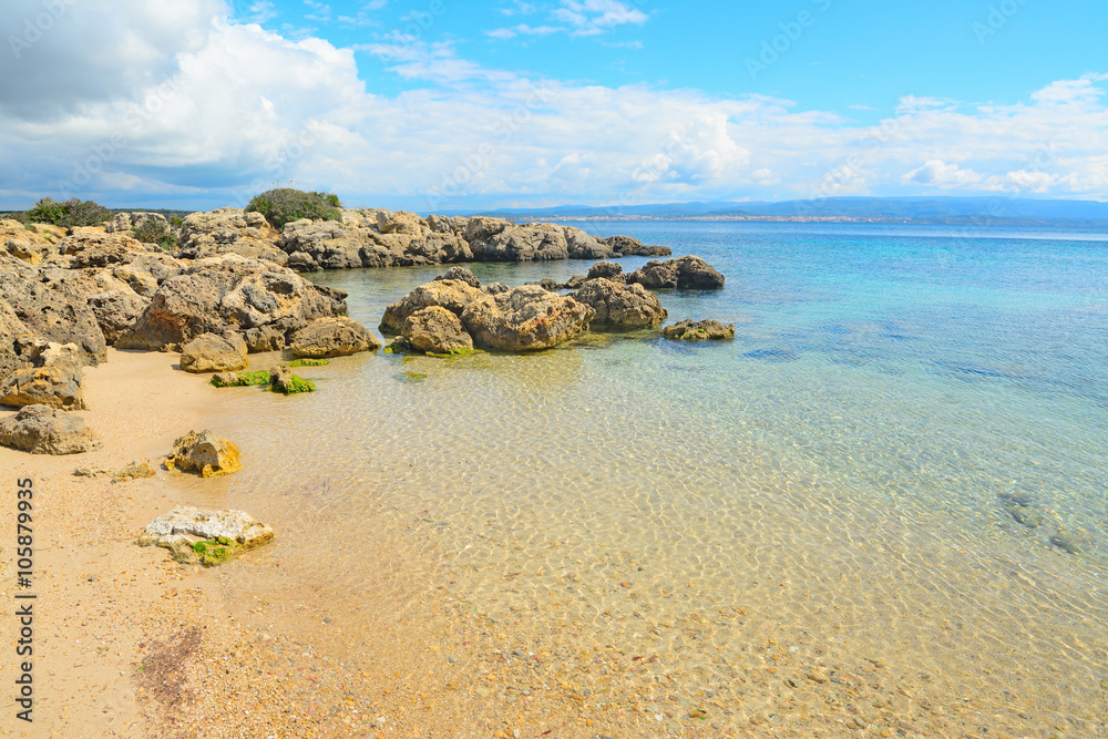 Obraz premium rocks and sand in Alghero coastline