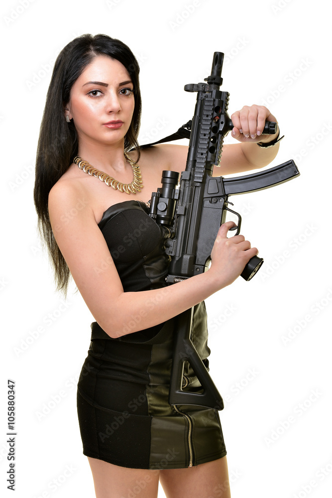 Sexy model woman with a gun 