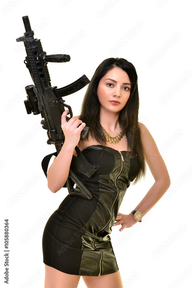 Sexy model woman with a gun 