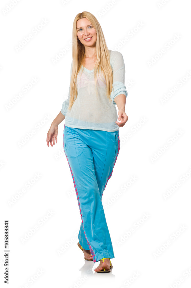 Young woman wearing blue training pants isolated on white Young woman wearing blue training pants isolated on white