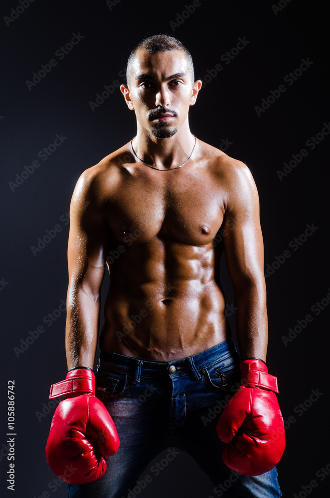 Ripped boxer in sports concept Ripped boxer in sports concept