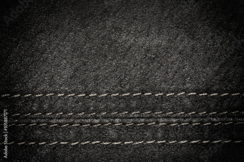 Black leather texture as background, horizontal line