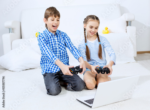 Kids playing game console