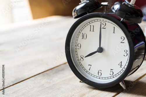 Wallpaper Mural Retro alarm clock on wooden table Torontodigital.ca