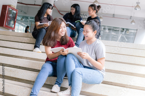 group of happy teen high school students outdoors, Asian, tutoring, Laptop, Tablet