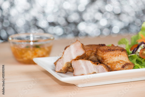 deep fried pork belly with spicy sauce photo