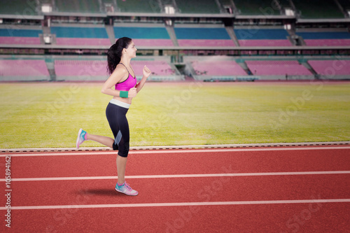 Female runner workout in stadium
