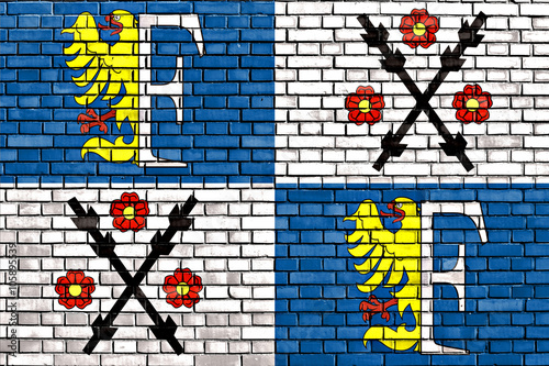 flag of Frydek-Mistek painted on brick wall