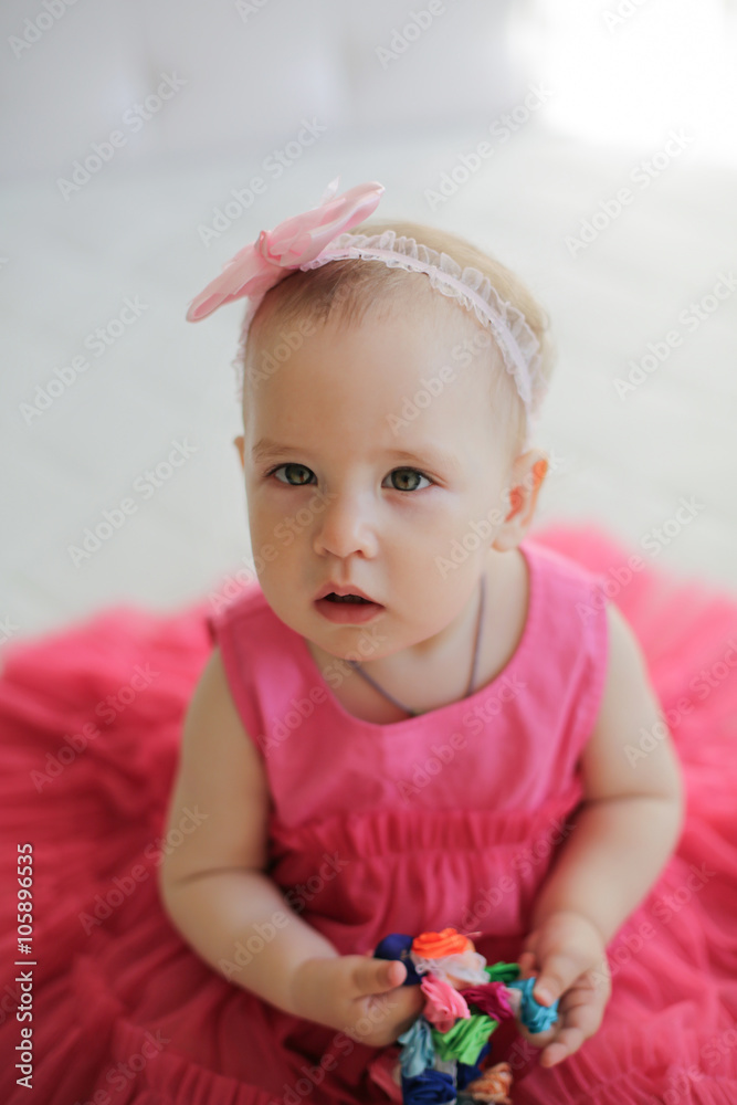 Portrait of cute little girl in pink dress Portrait of cute little girl in pink dress