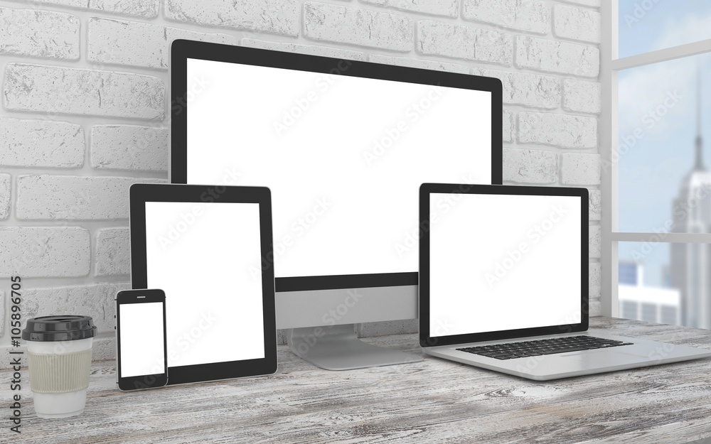 Responsive mockup screen. Monitor, laptop, tablet, phone on table in office. Responsive mockup screen. Monitor, laptop, tablet, phone on table in office.