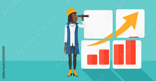 Woman looking at positive bar chart.
