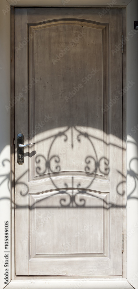 Entrance door with a shadow