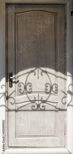 Entrance door with a shadow