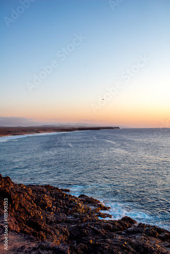 Coastline near El Cotillo village on Fuerteventura island on the sunset in Spain
