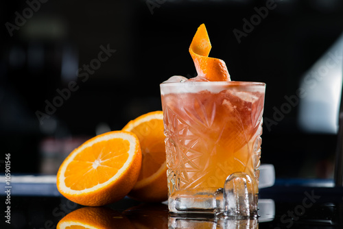 Fresh cocktail with orange and ice. Alcoholic, non-alcoholic dri