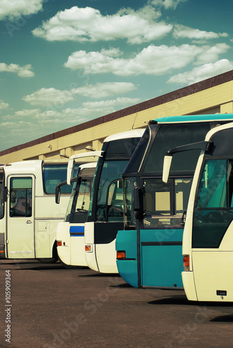 buses at the bus station with cloudy sky