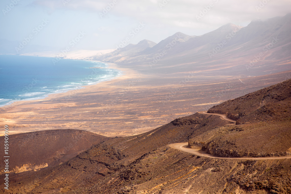 Fototapeta premium Top view on Cofete coastline the longest beach on Canary island