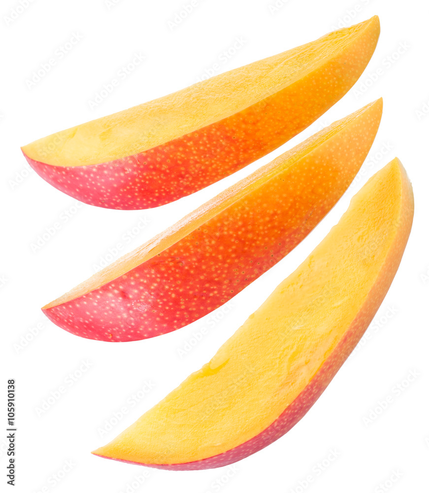 Slices of mango fruit over white. File contains clipping paths. Slices of mango fruit over white. File contains clipping paths.